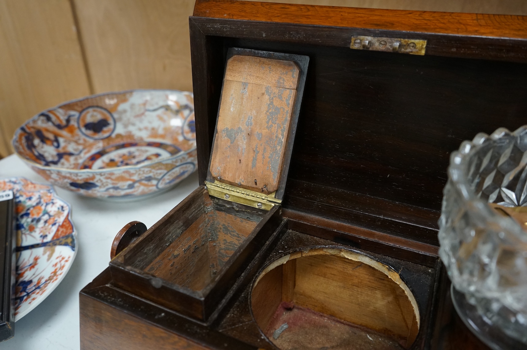 An early 19th century rosewood sarcophagus tea caddy, 39cm wide
